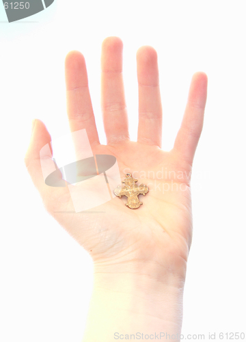 Image of hand holding cross