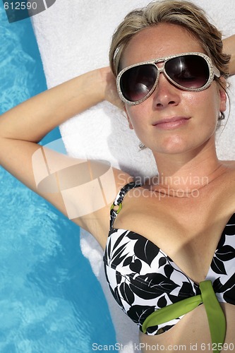 Image of Woman Sunbathing