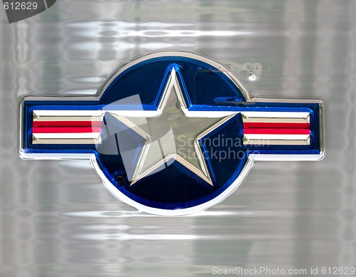 Image of star on brushed metal