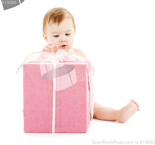 Image of baby boy with big gift box