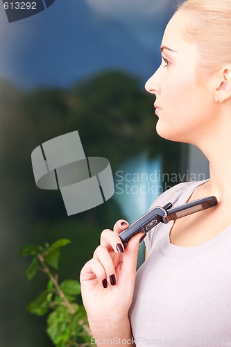 Image of lovely woman with cell phone
