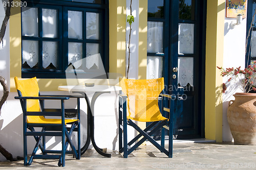 Image of cafe or taverna or hotel setting greek islands