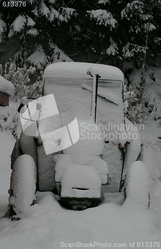 Image of Tractor covered in snow