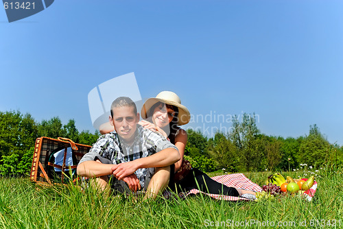 Image of Young couple at picnic