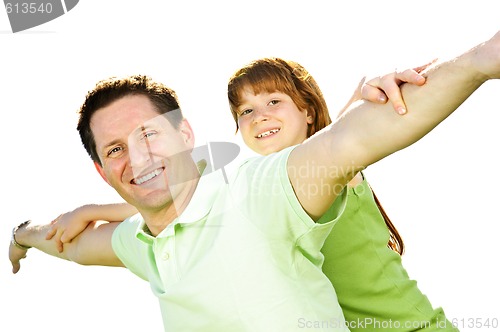 Image of Father and daughter piggyback