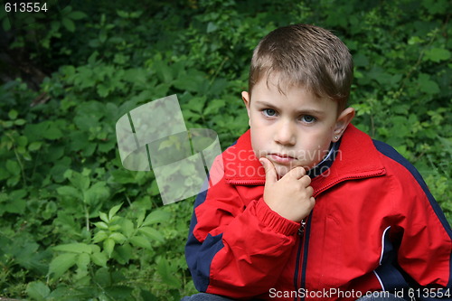 Image of angry boy with ear ring