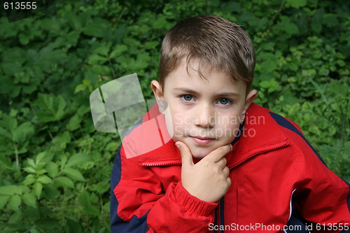 Image of thinker boy with ear ring