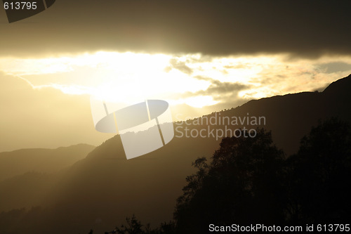 Image of sky, sun, mountain