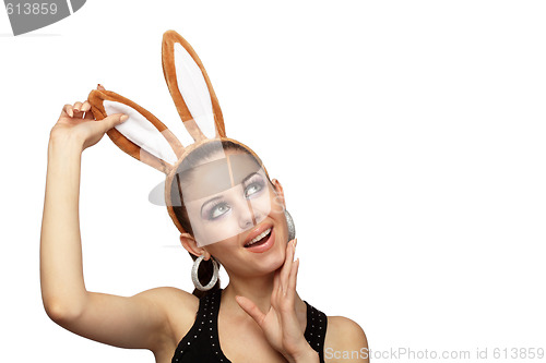 Image of Young playful woman with bunny ears