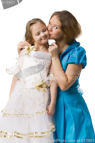 Image of mother kisses daughter