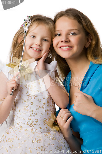 Image of mother and daughter in festive dresses