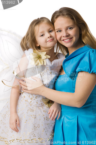 Image of Mum embraces  daughter