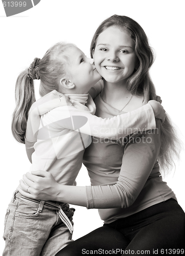 Image of daughter kisses mum