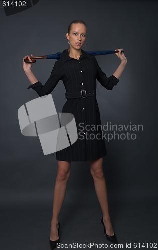 Image of young woman with umbrella