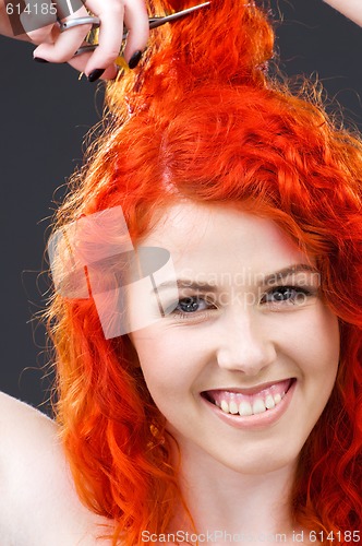 Image of redhead with scissors