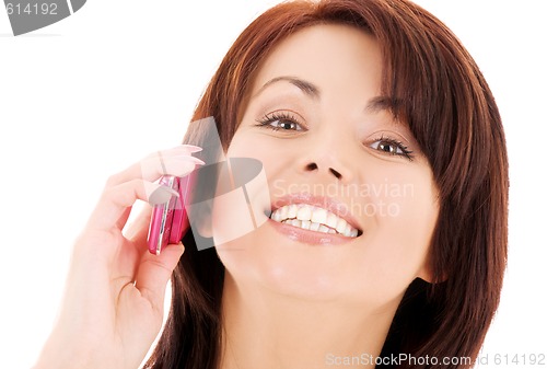 Image of happy woman with cell phone