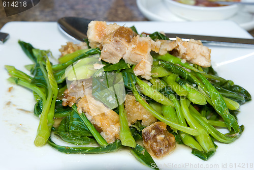 Image of Thai crispy pork with Chinese kale