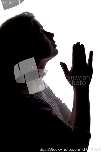 Image of praying silhouette