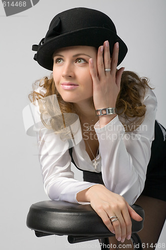 Image of smiling woman in bonnet