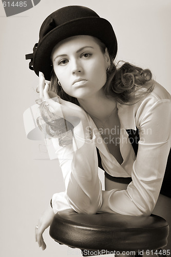 Image of young woman in bonnet