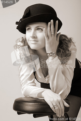 Image of smiling woman in bonnet