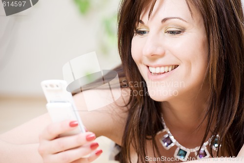 Image of woman with white phone