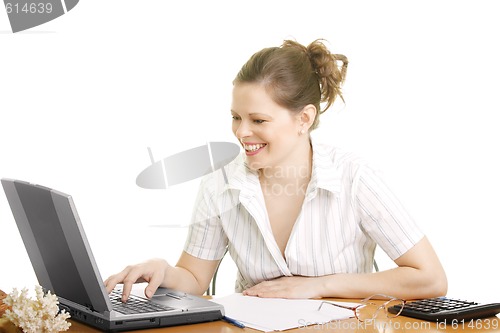 Image of Smiling businesswoman with computer
