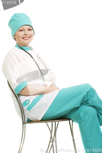 Image of Smiling doctor sitting on chair