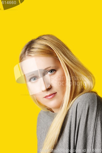 Image of Portrait of woman over yellow