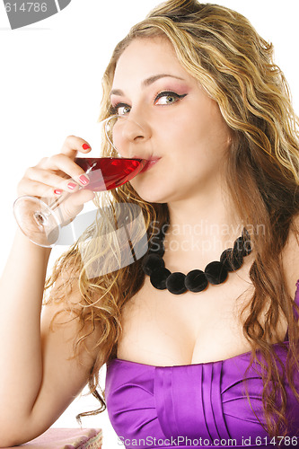 Image of Girl in purple drinks wine