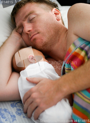 Image of Baby and father.