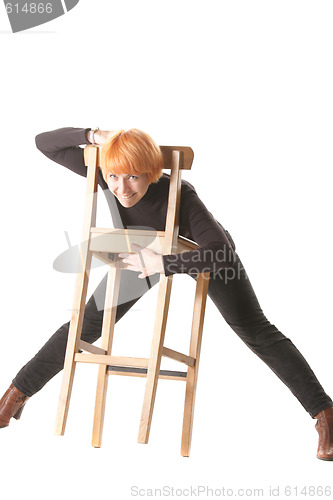 Image of Funny redhead with stool