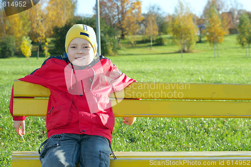 Image of On bench in park