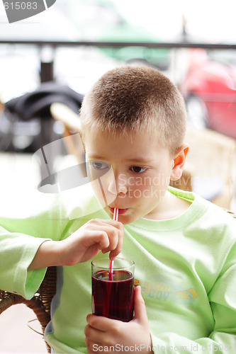 Image of Boy with cold drink