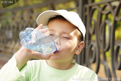 Image of Boy drinking water
