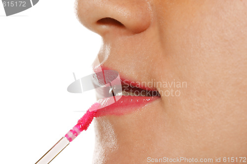 Image of Applying lipstick