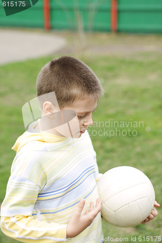 Image of Boy with ball in hand