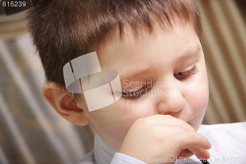 Image of Boy drinking juice close-up