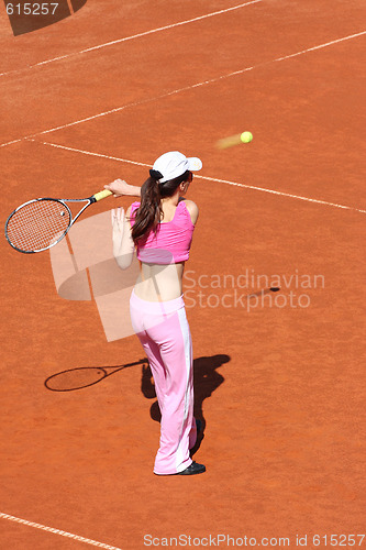 Image of Girl playing tennis