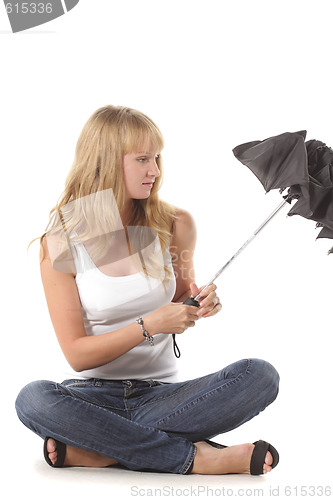 Image of Closing umbrella