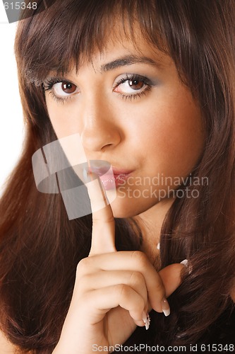 Image of Girl showing hush gesture