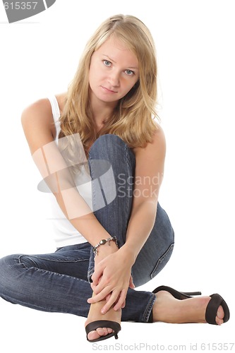Image of Sitting girl looking to camera