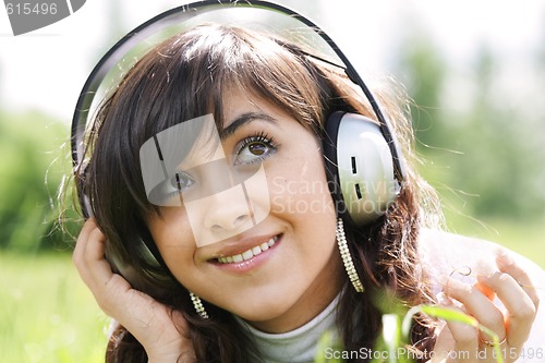 Image of Dreamy girl listening music
