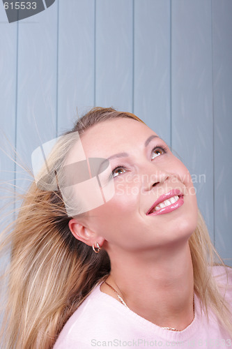 Image of Girl in pink looking up