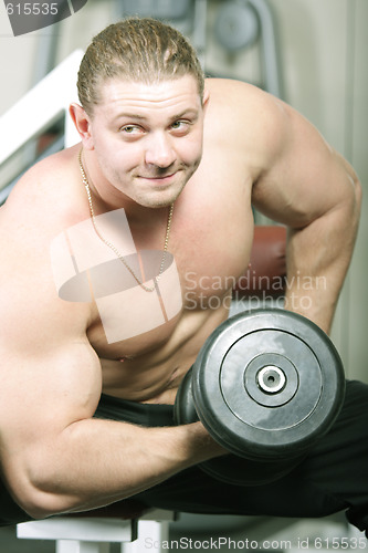 Image of Man with dumbbels