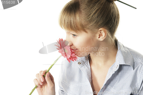 Image of Pretty girl with flower