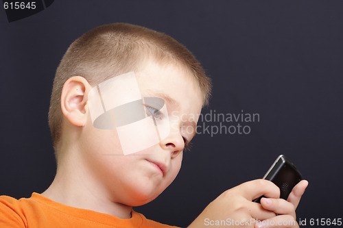 Image of Concentrated look to phone