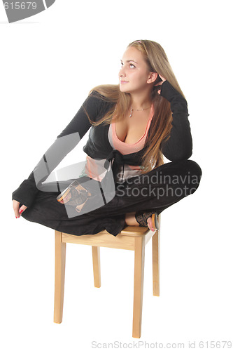 Image of Girl sitting with crossed legs