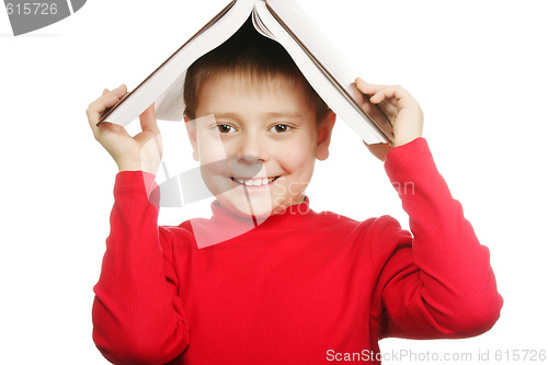 Image of Happy boy with book