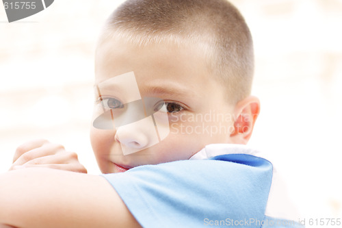 Image of Boy in blue shirt
